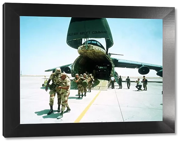 Gulf War US Troops disembark from a USAF Galaxy transport aircraft