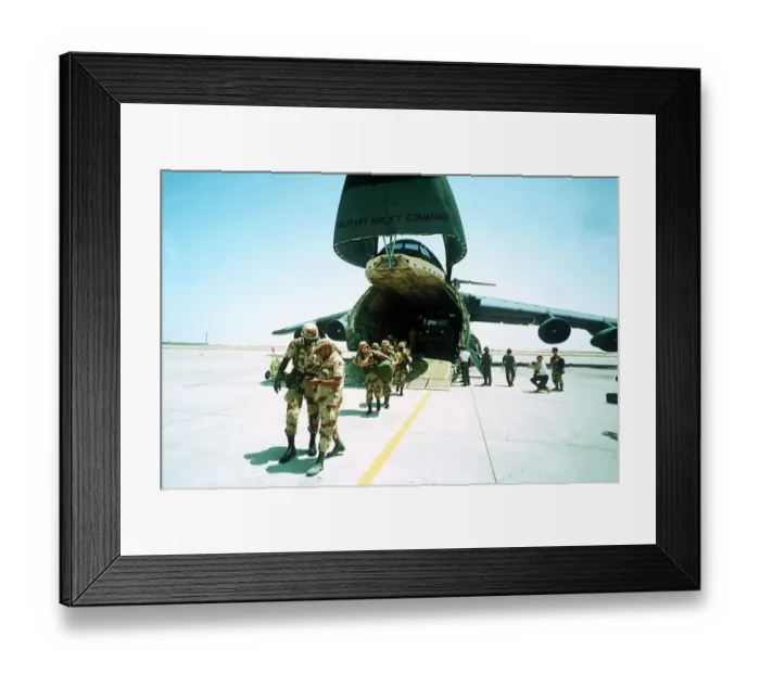 Framed Print : Gulf War US Troops disembark from a USAF Galaxy transport aircraft