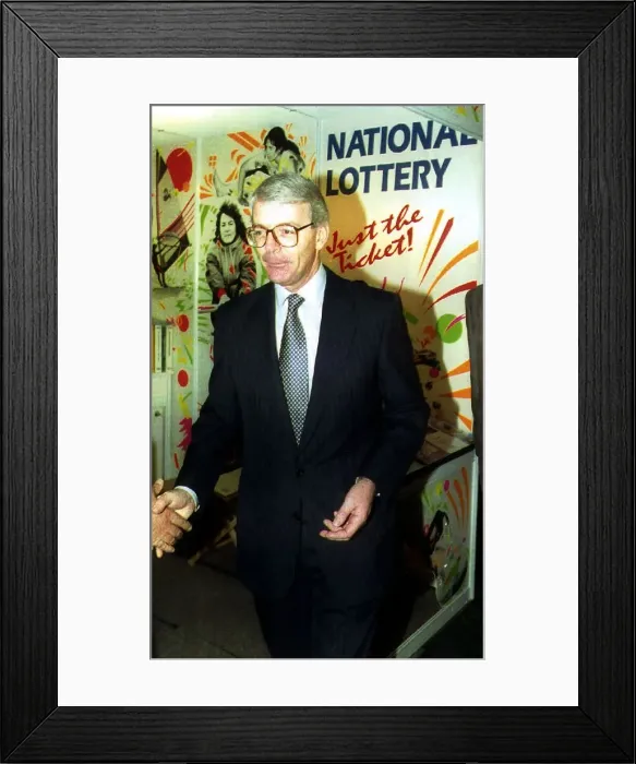 Framed Print : John Major Prime Minister visits the National Lottery stand in the Tory Conference Centre Framed Print : John Major Prime Minister visits the National Lottery stand in the Tory Conference Centre