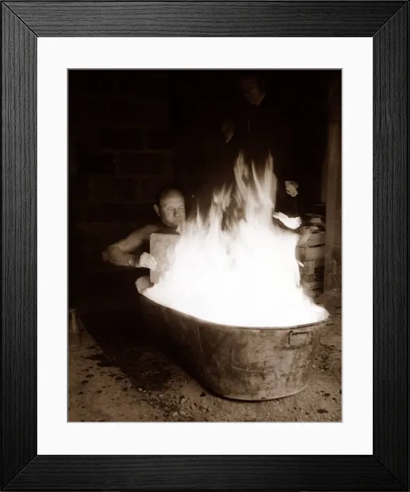 Framed Print : man sitting in Tub of Flames - man having a bath March 1969 Framed Print : man sitting in Tub of Flames - man having a bath March 1969