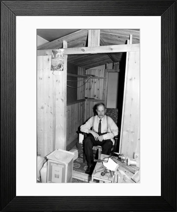 Framed Print : Old man inside a wooden shed. Jim Phillips at home in his little wooden hut Framed Print : Old man inside a wooden shed. Jim Phillips at home in his little wooden hut