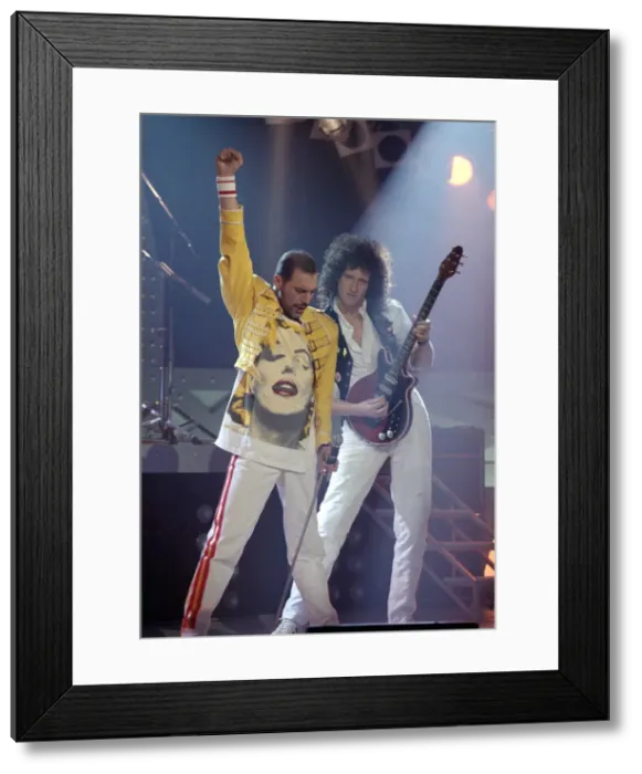 Framed Print : Queen Rock Group - Freddie Mercury and Brian May on stage. November 1989 Framed Print : Queen Rock Group - Freddie Mercury and Brian May on stage. November 1989