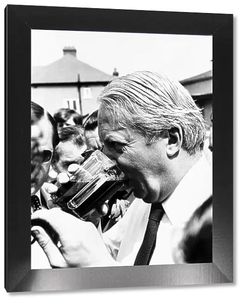 Edward Ted Heath British Prime Minister having a cool pint of beer during a '