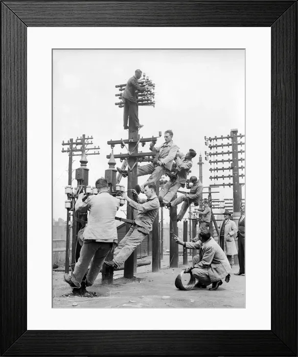 Framed Print : Telephone Engineers - Men working up telephone poles. Circa 1950 Framed Print : Telephone Engineers - Men working up telephone poles. Circa 1950