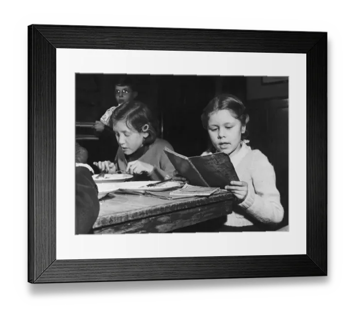 Framed Print : Schools Jose Wettner a pupil at the John Rennie School London revising for an exam. 1954