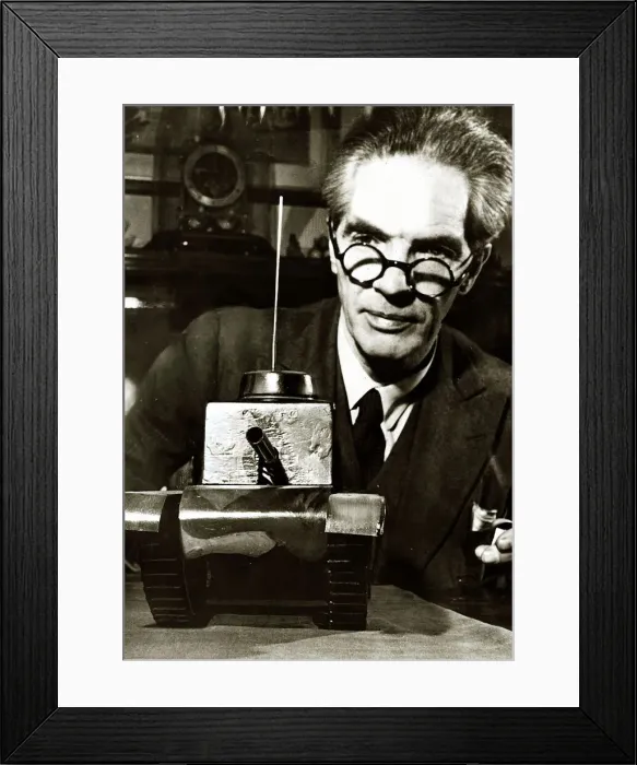 Framed Print : Tank Cigarette Dispenser - September 1956 the model tank shoots cigarettes from its