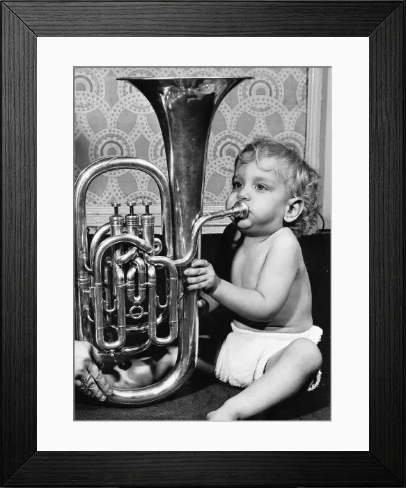 Framed Print : James Houlsby eighteen months old, playing the euphonium