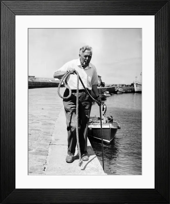 Framed Print : Harold Wilson MP on holiday in the Scilly Islands 1963 ties up his boat Framed Print : Harold Wilson MP on holiday in the Scilly Islands 1963 ties up his boat