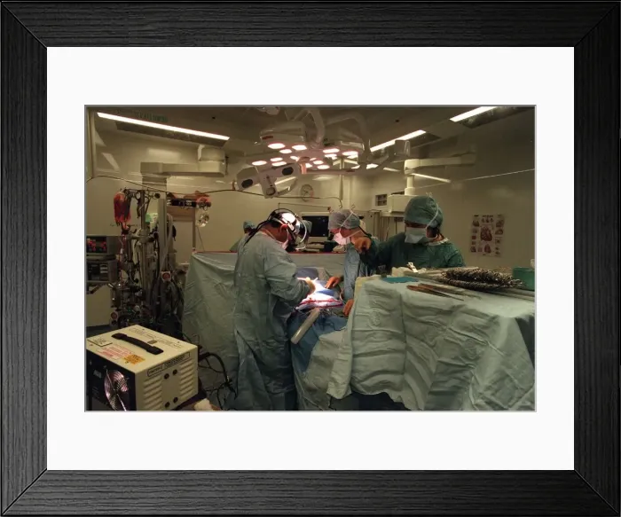 Framed Print : Babulal Sethia Paediatric heart surgeon performs open heart surgery on a small baby Framed Print : Babulal Sethia Paediatric heart surgeon performs open heart surgery on a small baby