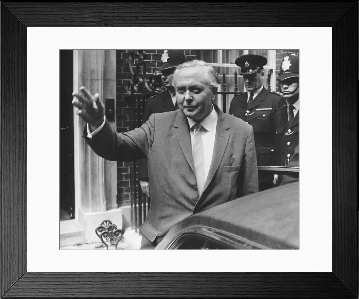 Framed Print : Harold Wilson Prime Minister leaving No 10 Downing street with policemen behind him 1966 Framed Print : Harold Wilson Prime Minister leaving No 10 Downing street with policemen behind him 1966