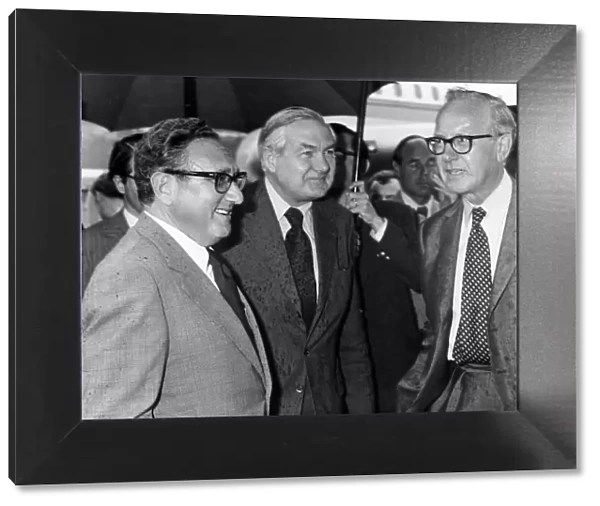 James Callaghan meets with Henry Kissinger at Heathrow Airport in the rain 1975