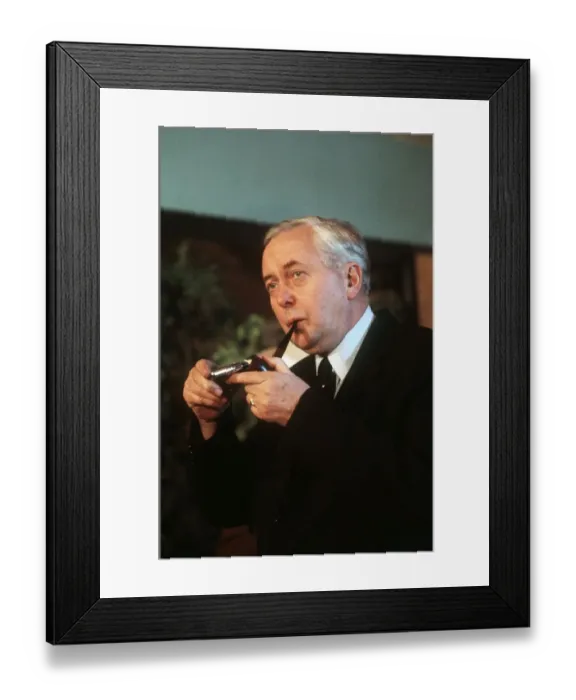 Framed Print : Harold Wilson former MP lighting a pipe circa 1975 Framed Print : Harold Wilson former MP lighting a pipe circa 1975