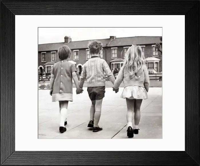 Framed Print : The young fellow is already turning into a real casanova. Circa 1950 Framed Print : The young fellow is already turning into a real casanova. Circa 1950