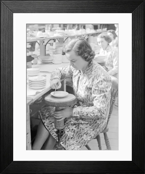 Framed Print : A pottery worker. Circa 1940 Framed Print : A pottery worker. Circa 1940