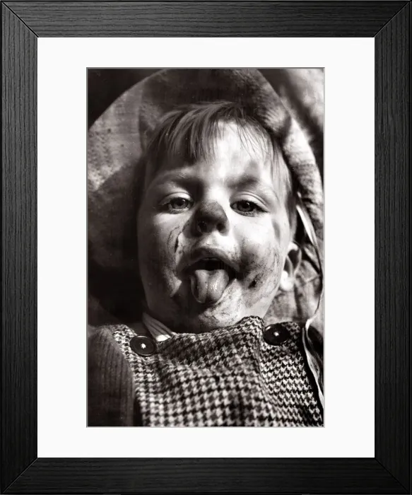 Framed Print : Girls face after eating chocolate, circa 1950 Framed Print : Girls face after eating chocolate, circa 1950