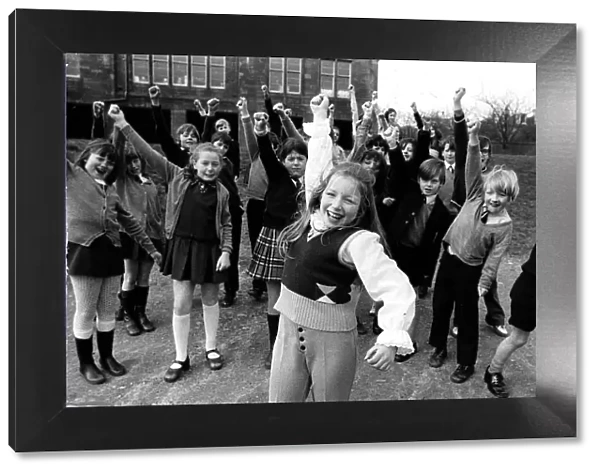 Lena Zavaroni singer fist in air with other schoolchildren. Circa 1960