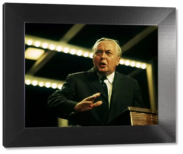Harold Wilson seen here wiping his brow whilst delivering his speech to conference