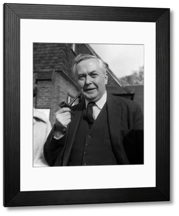 Framed Print : Harold Wilson with his famous pipe after voting in the Greater London Elections in Framed Print : Harold Wilson with his famous pipe after voting in the Greater London Elections in