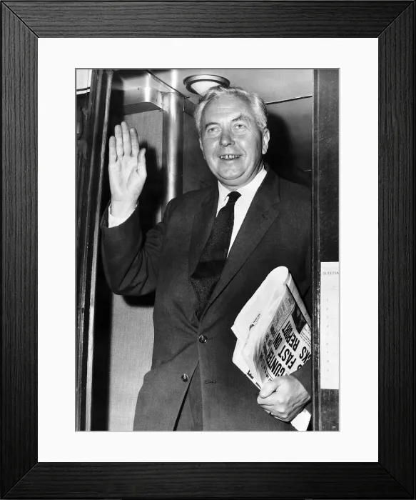 Framed Print : Harold Wilson Prime Minister waving and holding a newspaper under his arm 1965 Framed Print : Harold Wilson Prime Minister waving and holding a newspaper under his arm 1965