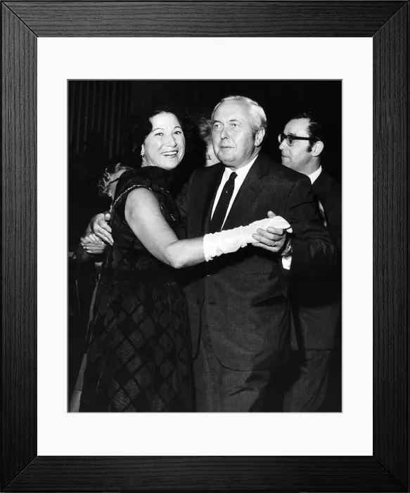 Framed Print : Harold Wilson with the wife ofs W Theobold at a dance to celebrate the end of the 1971