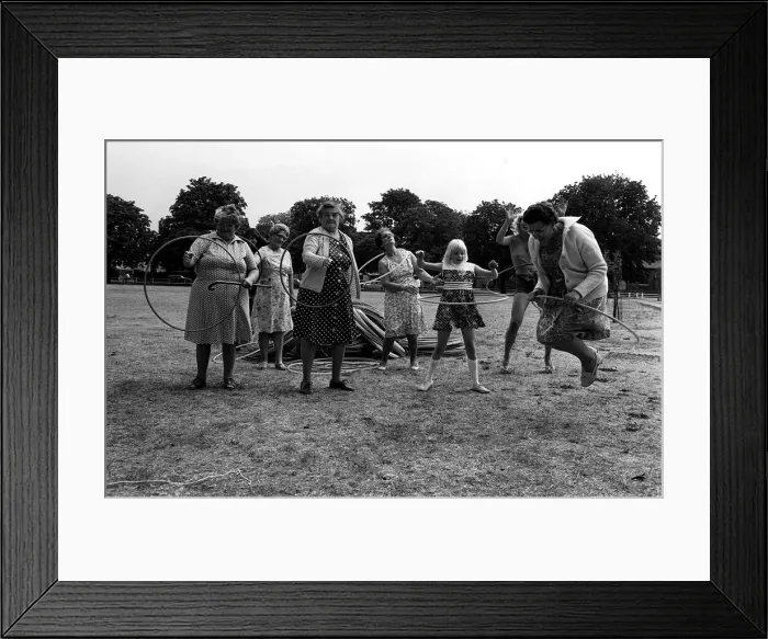 Framed Print : Pensioners playing with Hula Hoops in park August 1976 Framed Print : Pensioners playing with Hula Hoops in park August 1976