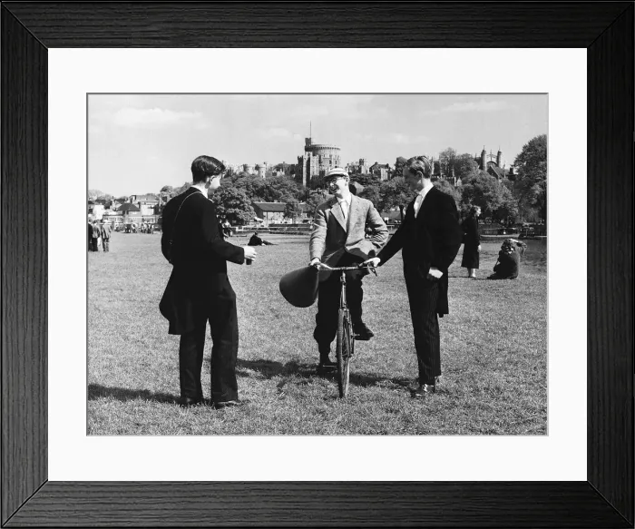 Framed Print : Eton scholars in uniform on the banks of the Thames Circa 1950