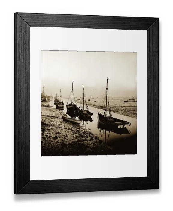 Framed Print : Cockle fishing boats moored in an estuary near the east coast of England. 1963 Framed Print : Cockle fishing boats moored in an estuary near the east coast of England. 1963