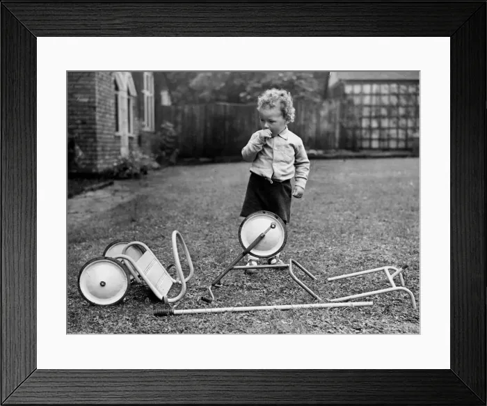 Framed Print : Two year old Paul Chapman of Manchester looks puzzled by the bits Framed Print : Two year old Paul Chapman of Manchester looks puzzled by the bits