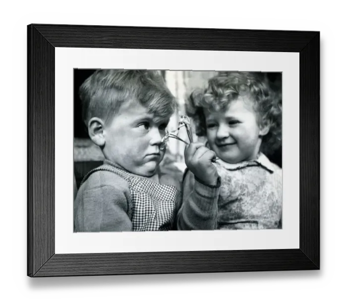 Framed Print : Christine Flynn flirting with a startled boyfriend. 1953