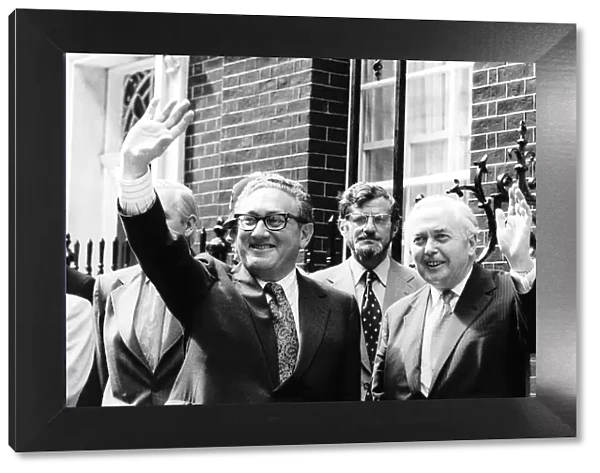American peace maker Dr Henry Kissinger (left) seen here after flying into London