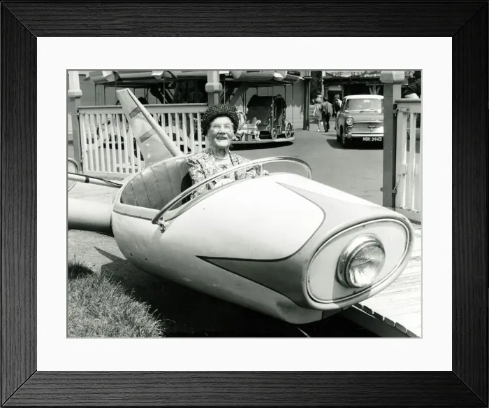Framed Print : Old age pensioner Ellen Pert 101 years old rides in a fairground dive-bomber car ride Framed Print : Old age pensioner Ellen Pert 101 years old rides in a fairground dive-bomber car ride