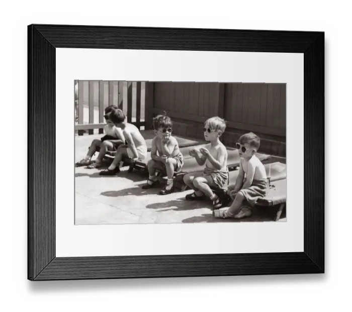 Framed Print : On a hot day in Newcastle, children at the New Bridge Street day nursery decided to do a Framed Print : On a hot day in Newcastle, children at the New Bridge Street day nursery decided to do a