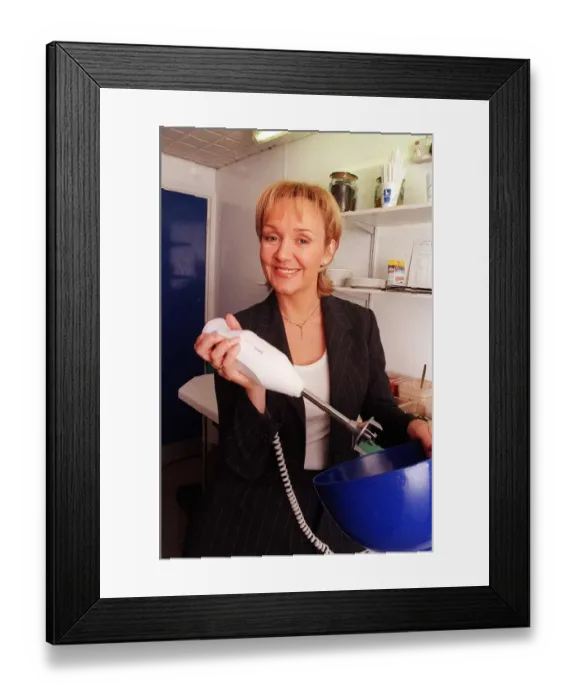 Framed Print : Amanda Reddington actress March 1998 is pictured holding a Bamix swiss made hand held