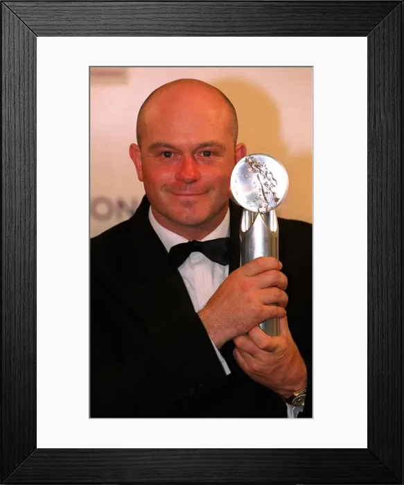 Framed Print : Ross Kemp actor at the British Soap Awards May 1999, pictured holding award Framed Print : Ross Kemp actor at the British Soap Awards May 1999, pictured holding award