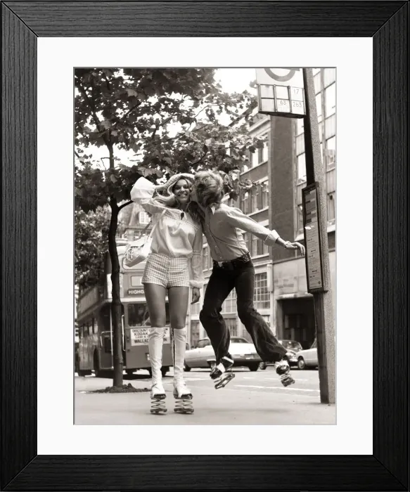 Framed Print : Nigel Lythgoe pictured in 1971 kissing Heather Berkers with springs on his shoes