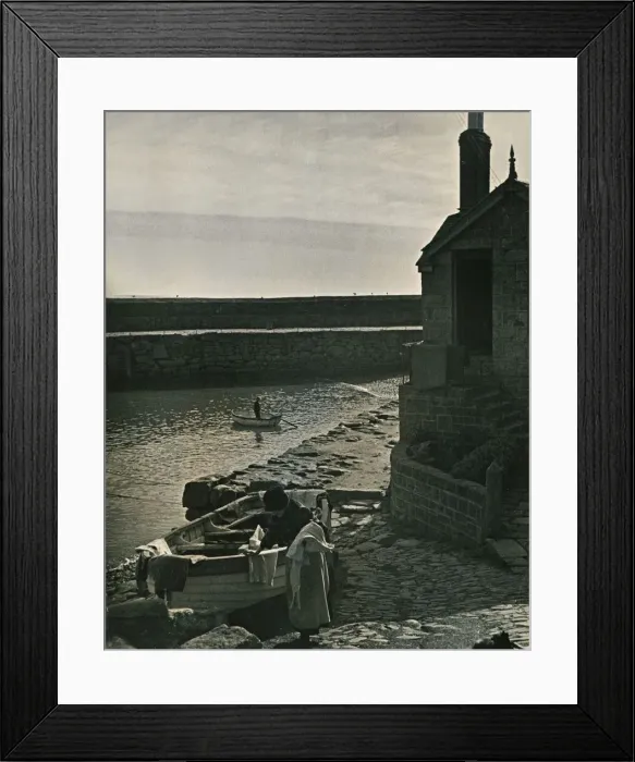 Framed Print : Washing day, the boat used for drying right on the harbour shore Framed Print : Washing day, the boat used for drying right on the harbour shore