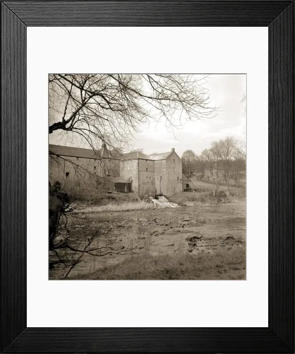 Framed Print : The Old Avon Mill which is still powered (grindstone still turned) by the River Avon