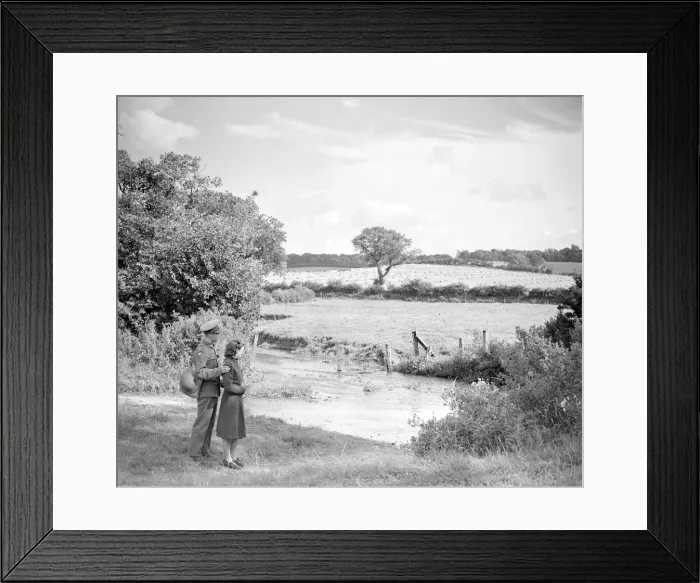 Framed Print : A soldier and his girlfriend look across the ford to the fields and the harvest beyond Framed Print : A soldier and his girlfriend look across the ford to the fields and the harvest beyond
