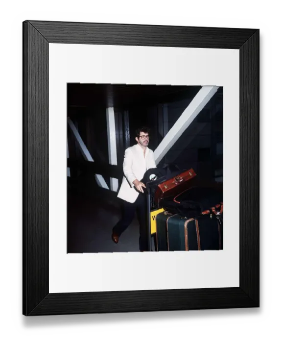 Framed Print : George Lucas the director arriving at LAP from San Fransisco May 1985 Framed Print : George Lucas the director arriving at LAP from San Fransisco May 1985