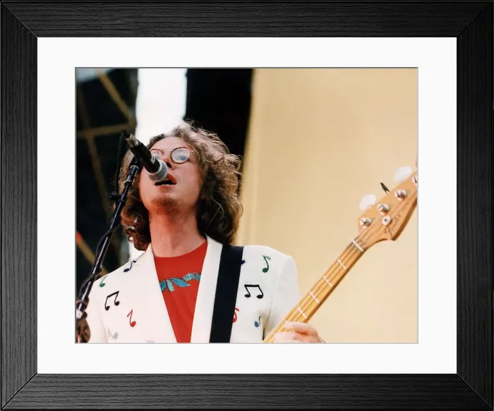 Framed Print : Mike Mills bass guitarist pop group REM on stage 1995 Framed Print : Mike Mills bass guitarist pop group REM on stage 1995