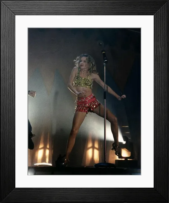 Framed Print : Kylie Minogue at her concert were she is dancing to the music Framed Print : Kylie Minogue at her concert were she is dancing to the music