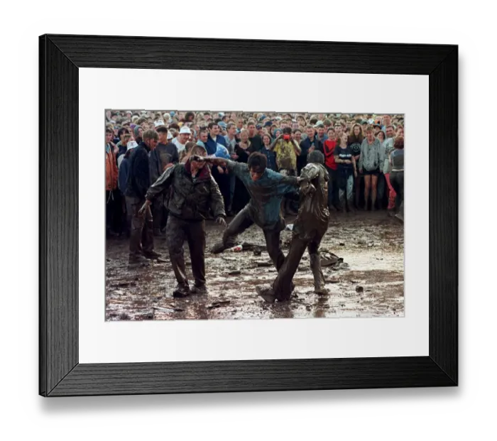 Framed Print : T in the Park July 1997 People mud fighting at T in the Park at Balado Airfoeld near Framed Print : T in the Park July 1997 People mud fighting at T in the Park at Balado Airfoeld near