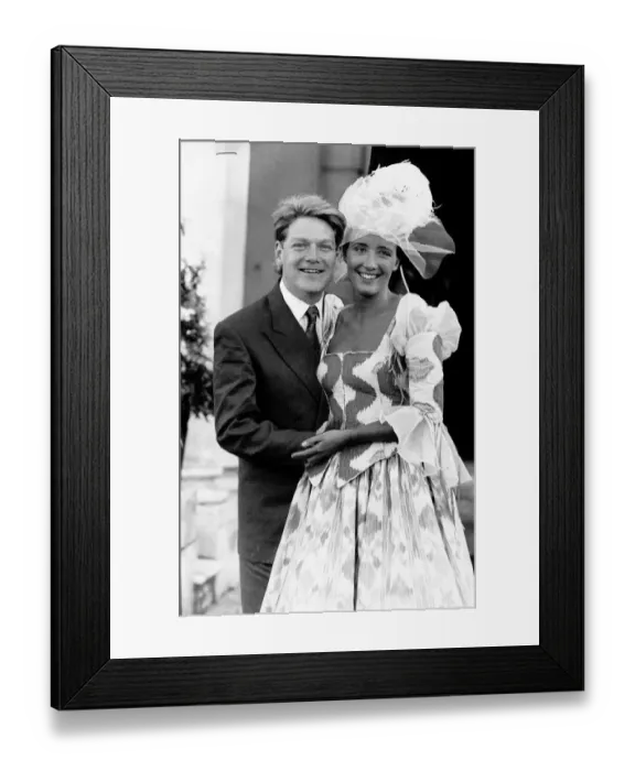 Framed Print : Kenneth Branagh director and actor stands with his new wife Emma Thompson