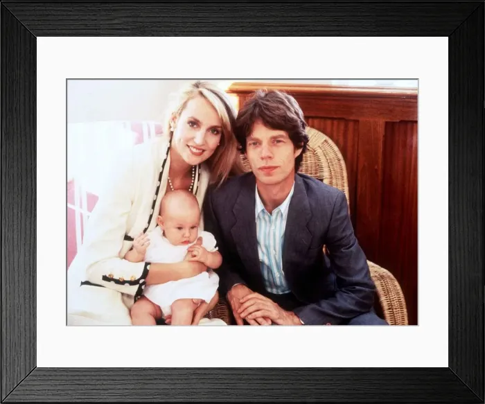 Framed Print : Rolling Stones: Jerry Hall and Mick Jagger christening baby daughter Elizabeth Scarlett Framed Print : Rolling Stones: Jerry Hall and Mick Jagger christening baby daughter Elizabeth Scarlett
