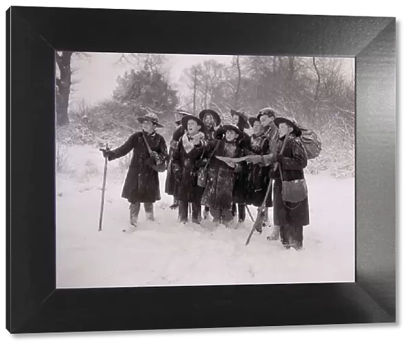 A group of children playing outside in the snow January 1954