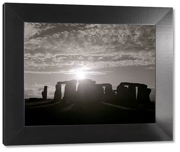 The sun as it rises above Stonehenge in Wiltshire south west England on the day of