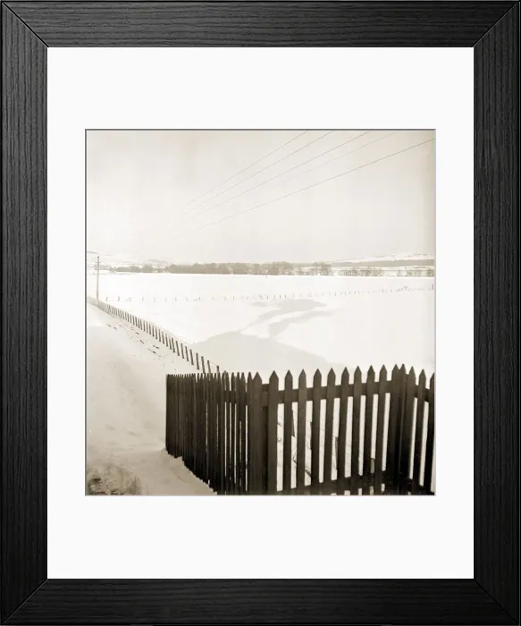Framed Print : A train billowing steam casts a shadow on the first mantle of snow as it travels Framed Print : A train billowing steam casts a shadow on the first mantle of snow as it travels