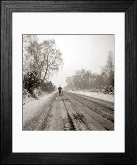 Framed Print : Man pushing bicycle along muddy country lane Countryside road Snow snowy Framed Print : Man pushing bicycle along muddy country lane Countryside road Snow snowy