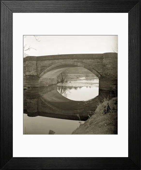 Framed Print : The Burn is tranquil as it passes underneathe the bridge in the fading sunlight not far Framed Print : The Burn is tranquil as it passes underneathe the bridge in the fading sunlight not far