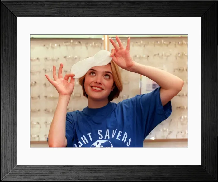 Framed Print : BBC TV Presenter Kate Heavner October 1999 About to test her eye sight at Boots Framed Print : BBC TV Presenter Kate Heavner October 1999 About to test her eye sight at Boots